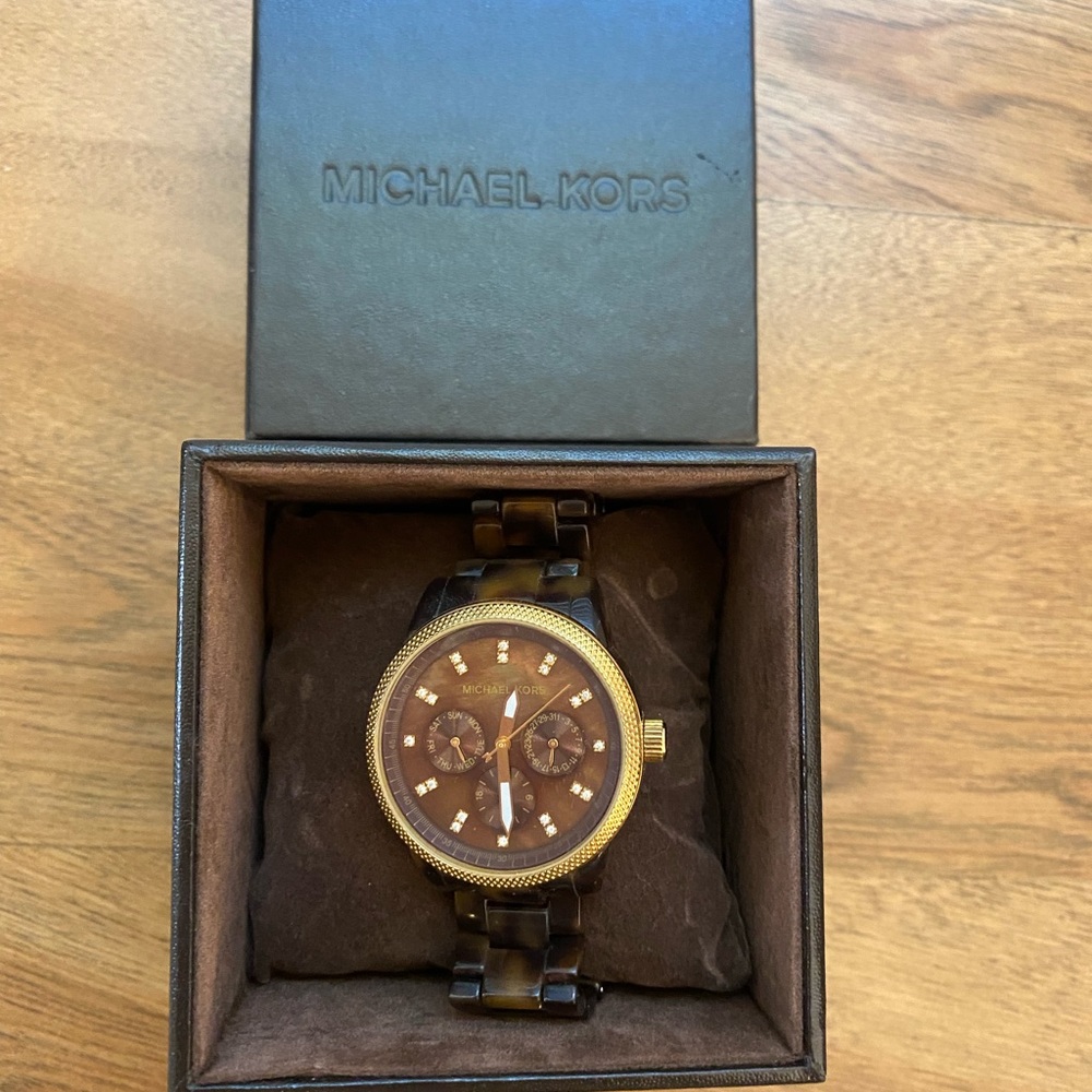 Michael Kors tortoise watch.
